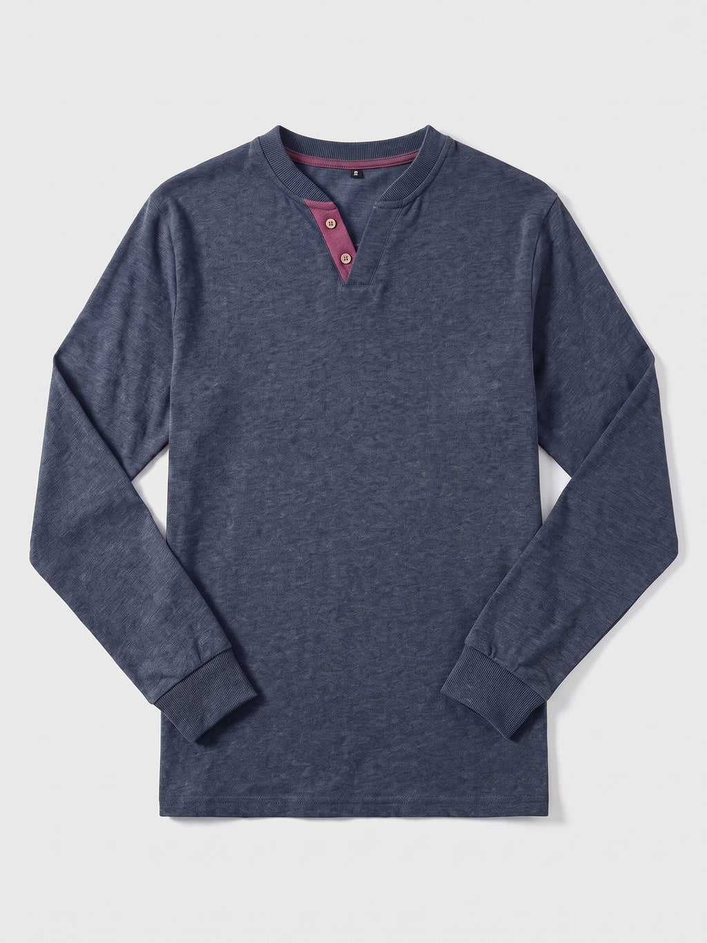 Navy cotton long sleeve Henley shirt laid flat, featuring a ribbed collar and cuffs with a two-button placket.