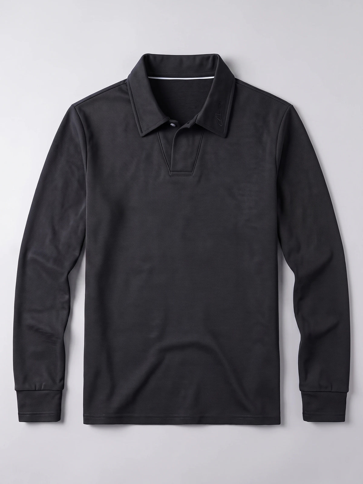 Black Long Sleeve Polo laid flat, showing the turn-down collar, button placket, and ribbed cuffs.