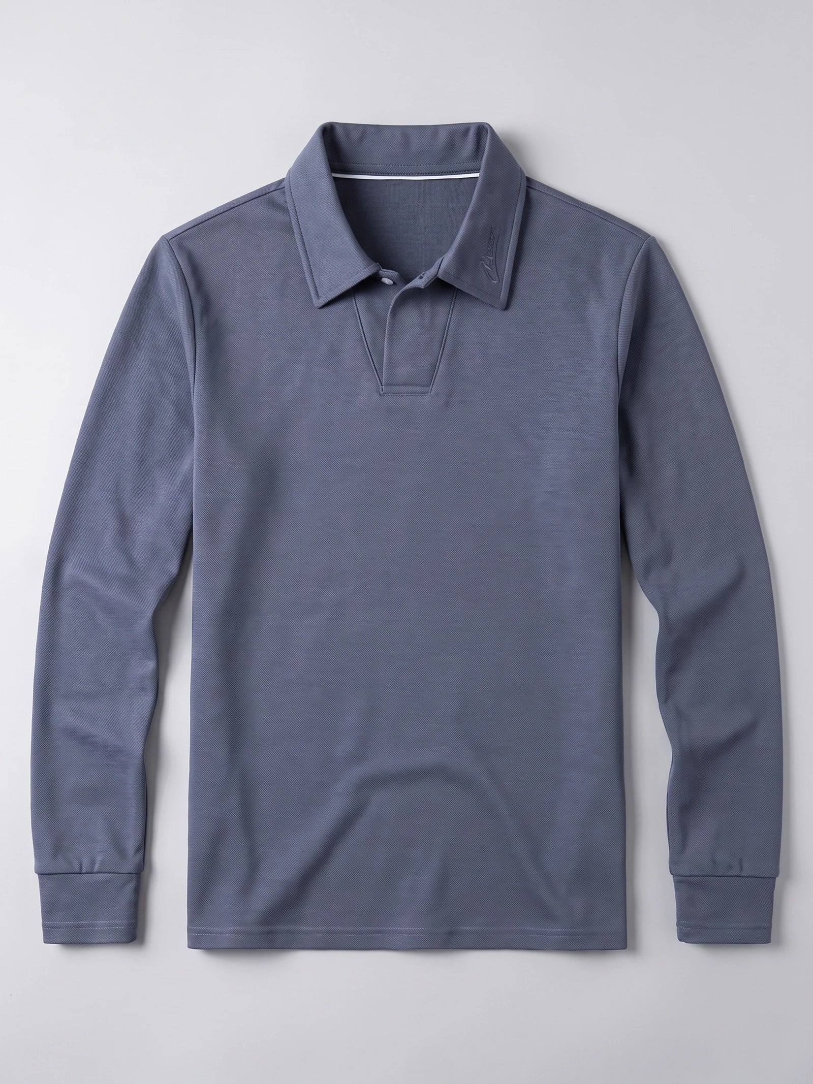 Blue long sleeve polo shirt laid flat, featuring a turn-down collar, short button placket, embroidered collar detail, and cuffed sleeves.