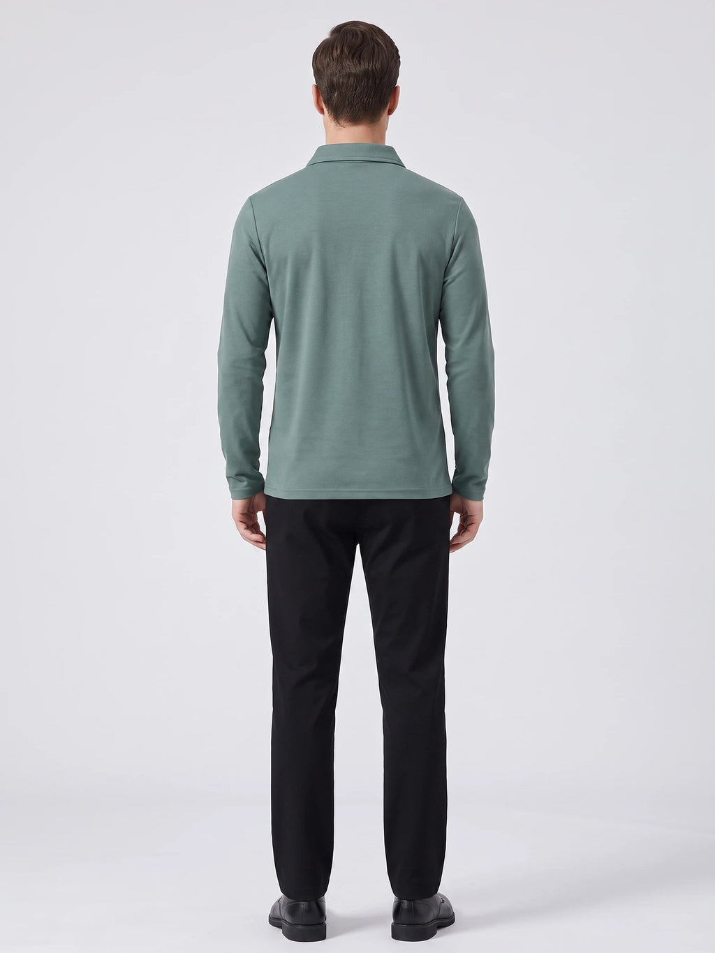 Rear studio view of a model wearing a Green men's long sleeve polo shirt.