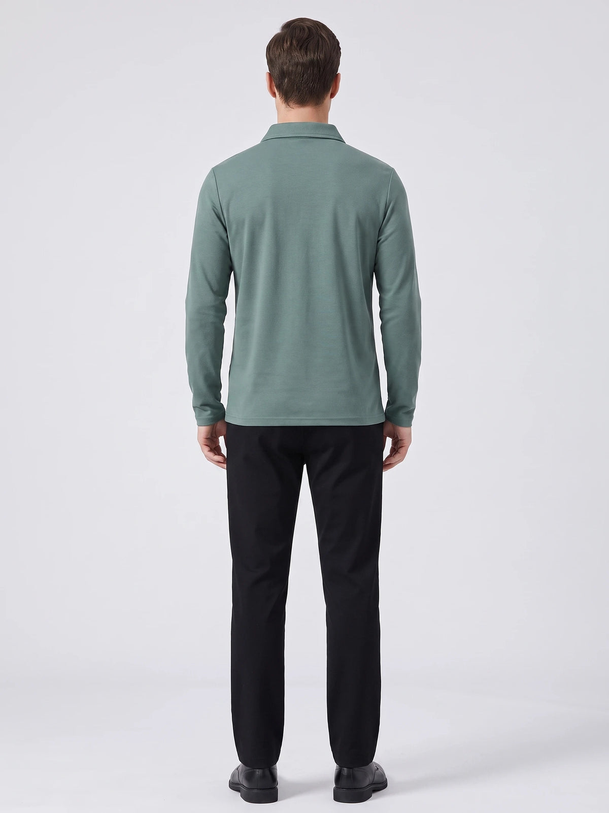 Rear studio view of a model wearing a Green men's long sleeve polo shirt.