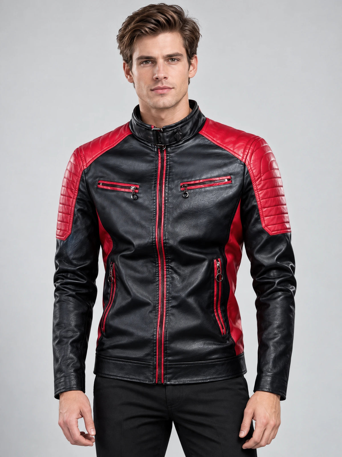 Front studio view of a model wearing a Red Moto Leather Jacket with quilted shoulder panels, stand collar, and zippered pockets.