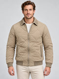 Front studio view of a model wearing a Beige Men Padded Lapel Jacket with diamond quilting, zip closure, and textured collar and cuffs.