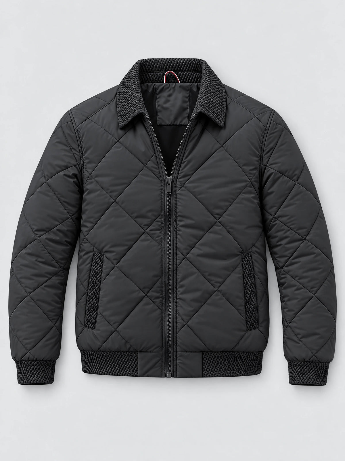 Black men’s padded lapel jacket laid flat, featuring diamond quilting, a front zipper, and textured collar, cuffs, and pocket trims.