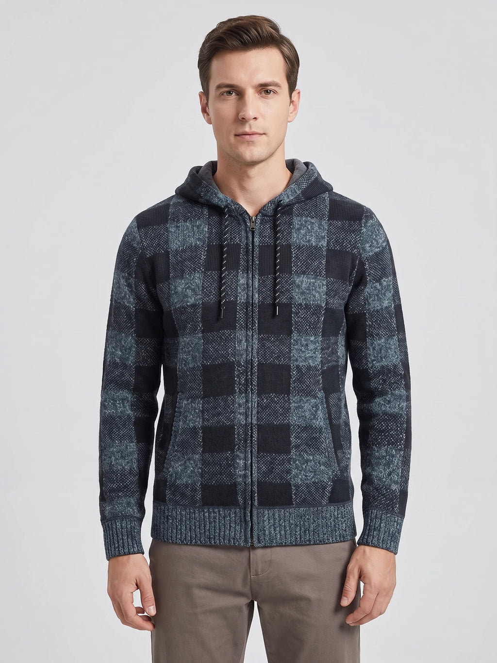 Front studio view of a model wearing a Blue Plaid Flannel hooded jacket with a full zip closure and ribbed cuffs.