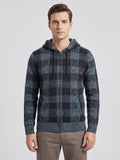 Front studio view of a model wearing a Blue Plaid Flannel hooded jacket with a full zip closure and ribbed cuffs.