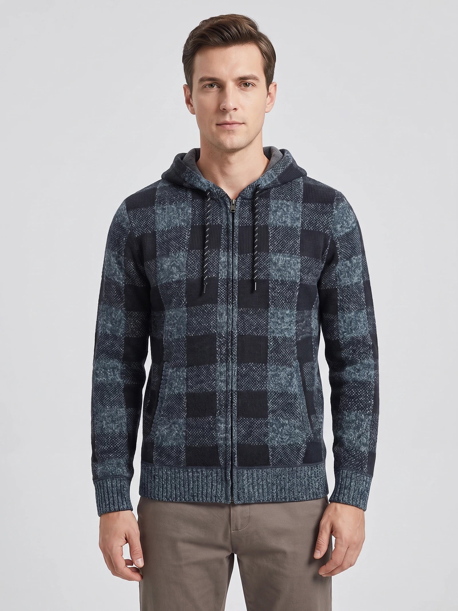 Front studio view of a model wearing a Blue Plaid Flannel hooded jacket with a full zip closure and ribbed cuffs.