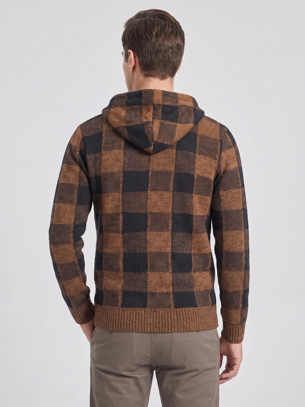 Rear view of a model wearing a Brown Plaid Flannel hooded men's jacket with ribbed cuffs and hem.