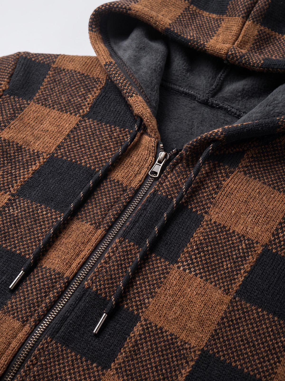 Close-up of the Brown Plaid Flannel men's jacket showing its hood, fleece lining, drawstrings, and front zipper.