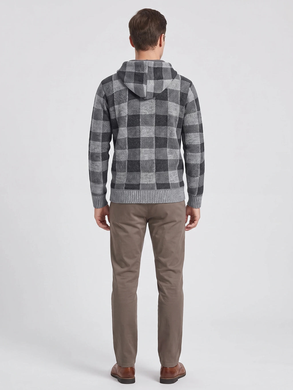 Rear studio view of a model wearing a Gray Plaid Flannel hooded men's jacket with ribbed cuffs and hem.