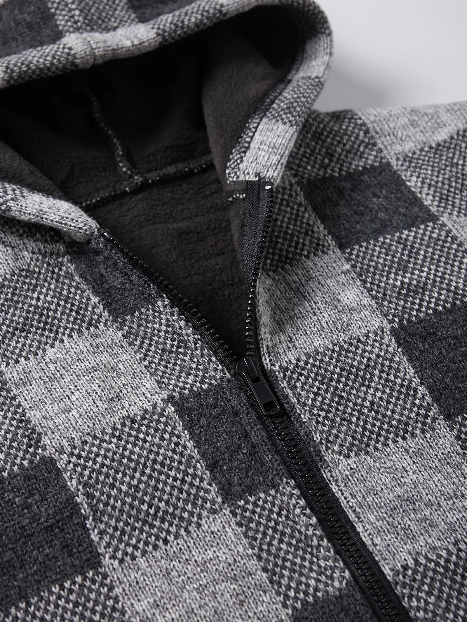 Close-up of the Gray Plaid Flannel men's jacket showing the fleece-lined collar and front zipper.