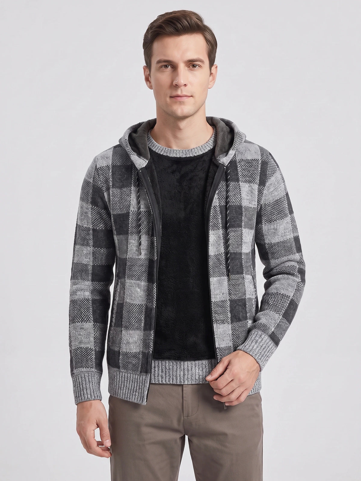 Front studio view of a model wearing a Gray Plaid Flannel hooded jacket with a zip front and ribbed cuffs.