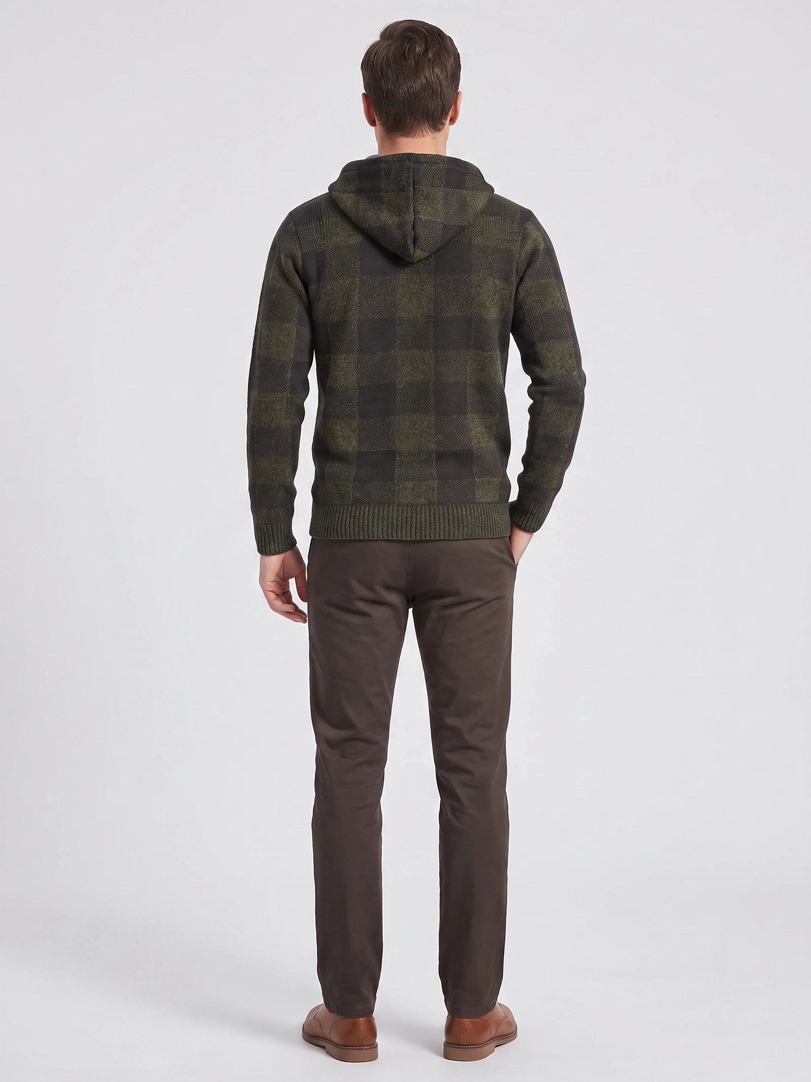 Rear studio view of a model wearing a Green Plaid Flannel hooded men's jacket with ribbed cuffs and hem.