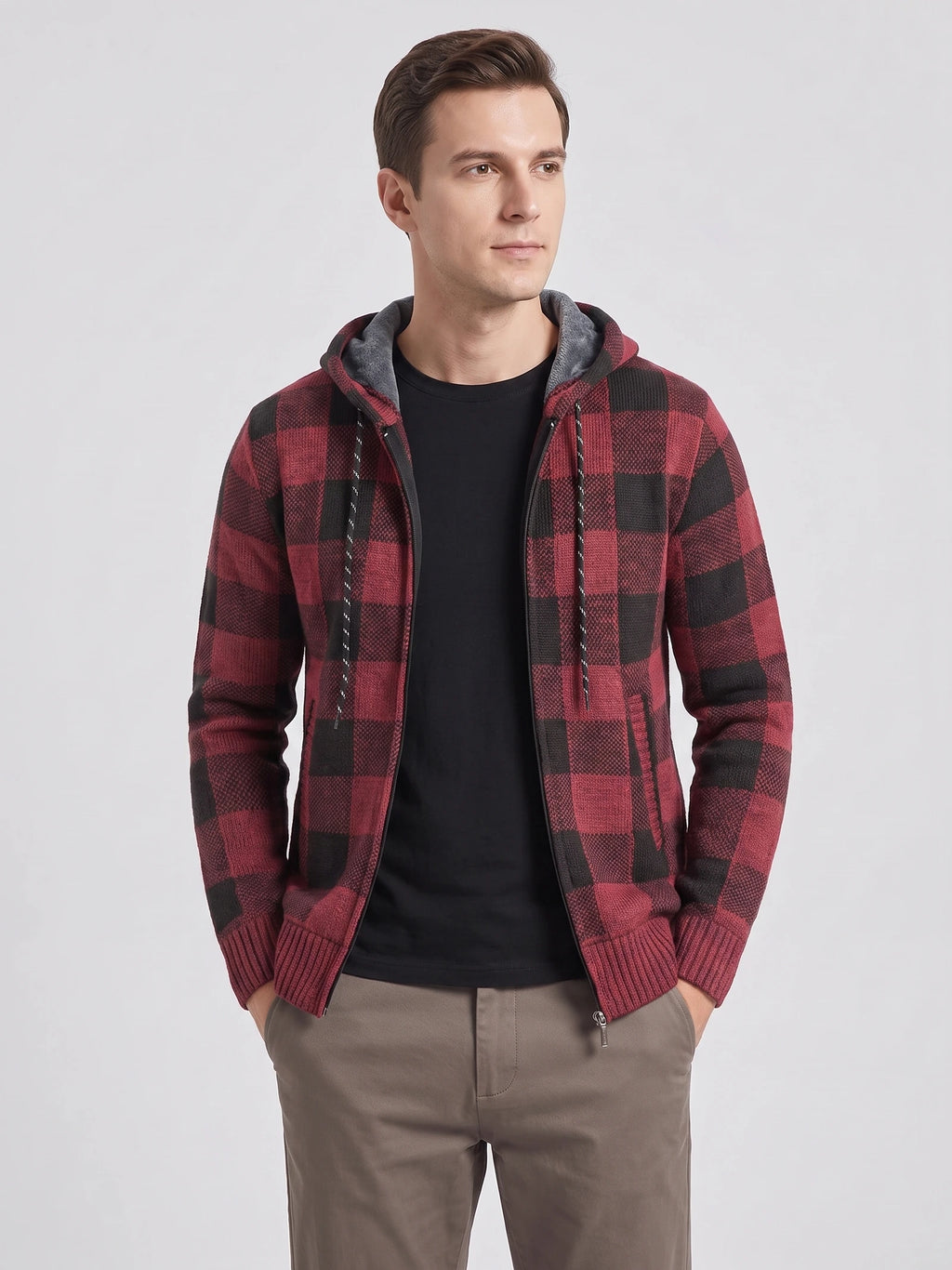 Front studio view of a model wearing a Wine Plaid Flannel hooded jacket with a zip front and ribbed cuffs.