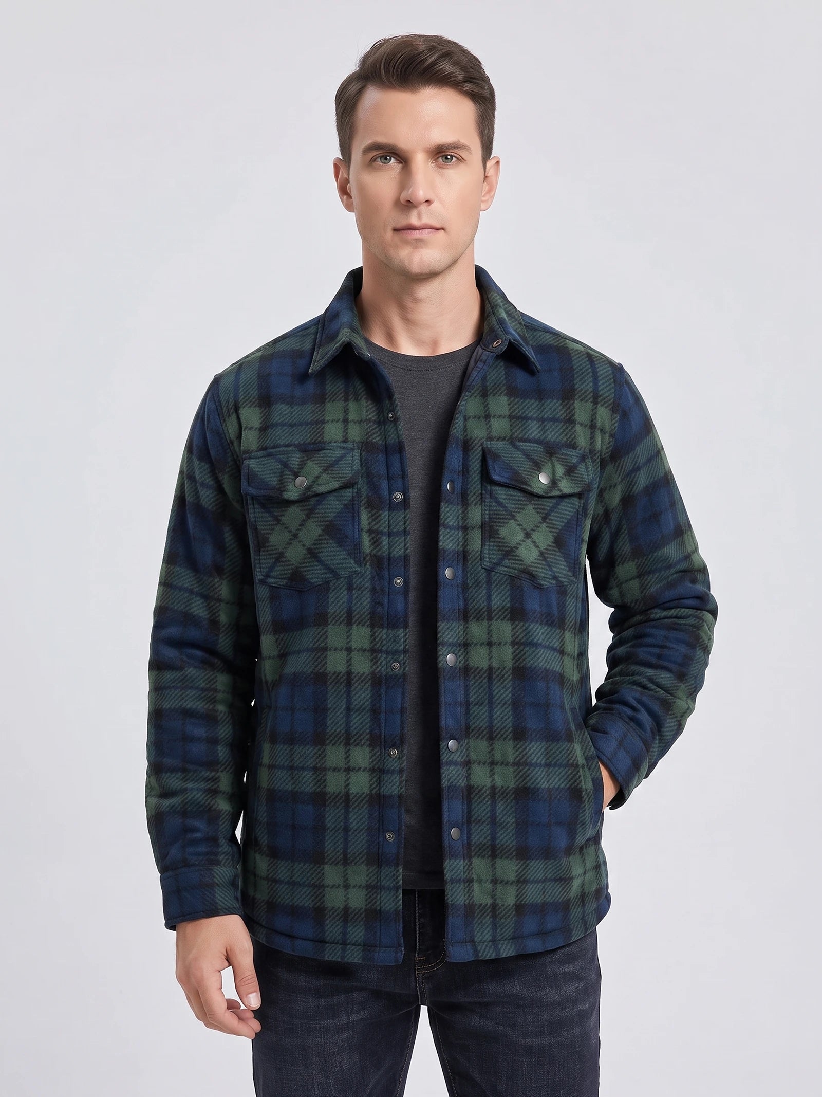 Front studio view of a model wearing a Green plaid Flannel Jacket with snap-button chest pockets.