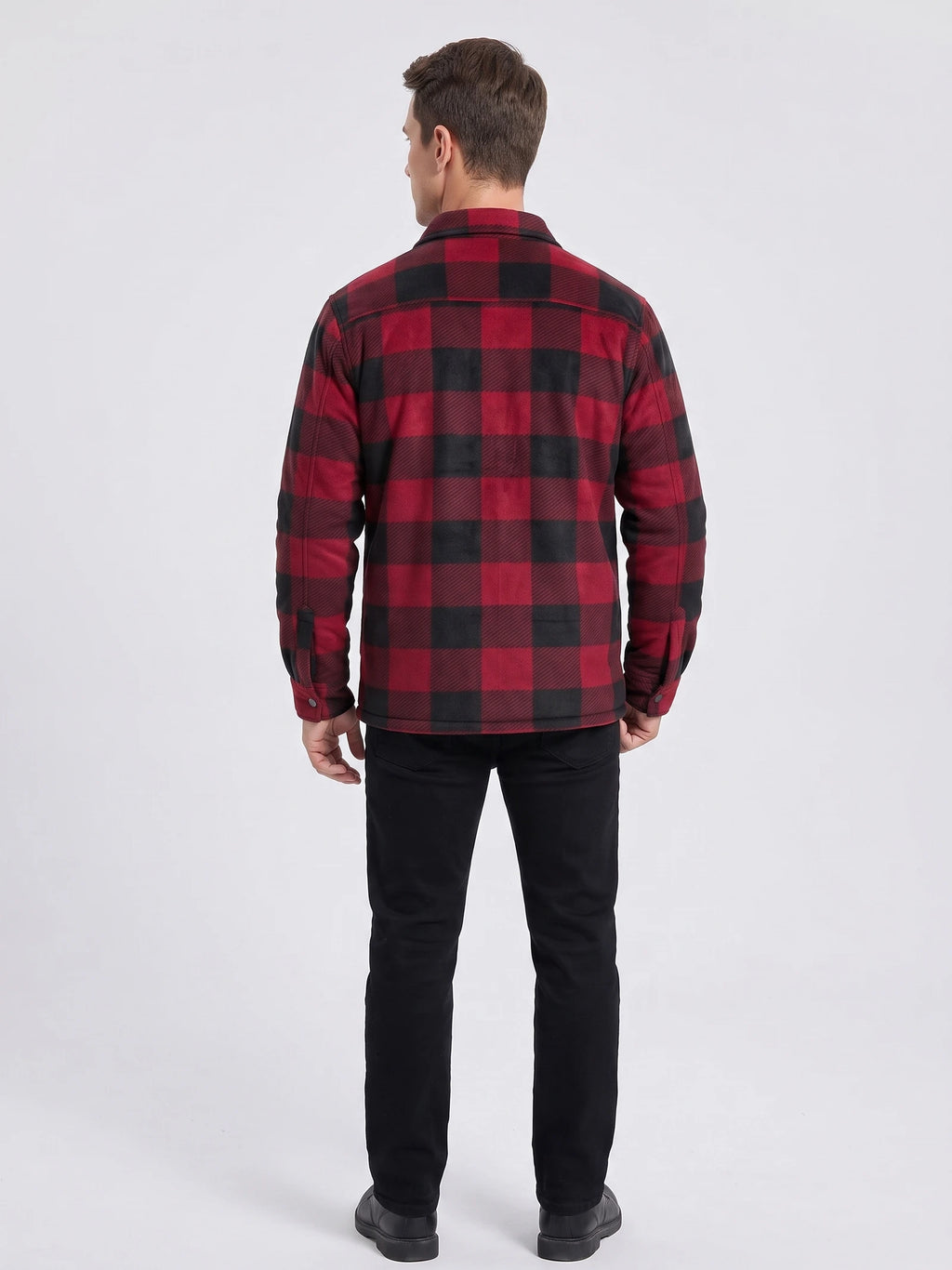 Rear studio view of a model wearing a Red plaid flannel jacket with long sleeves and button cuffs.