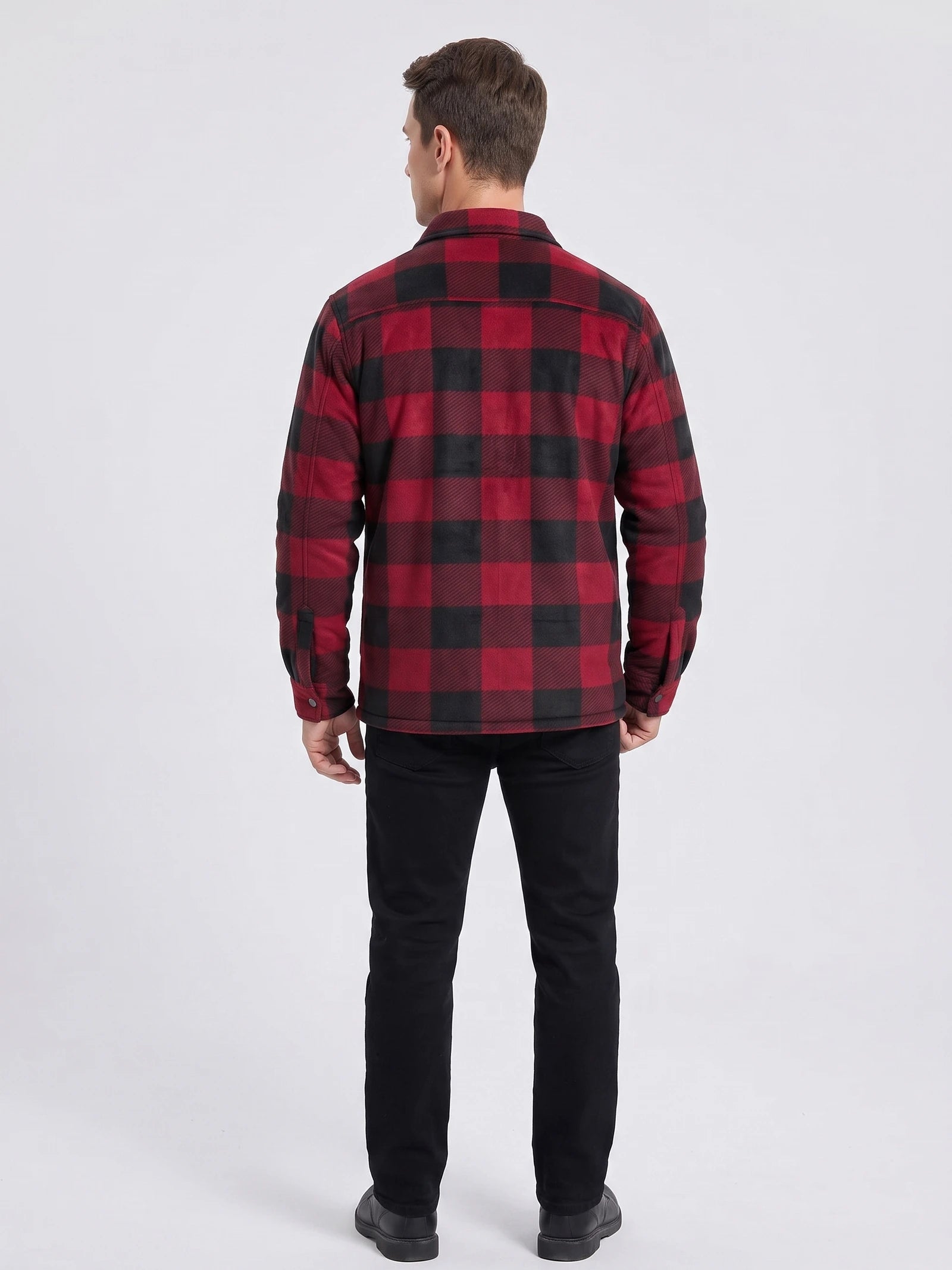 Rear studio view of a model wearing a Red plaid flannel jacket with long sleeves and button cuffs.