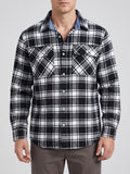 Front studio view of a model wearing a Black plaid flannel shirt with a button front, long sleeves, and two flap chest pockets.