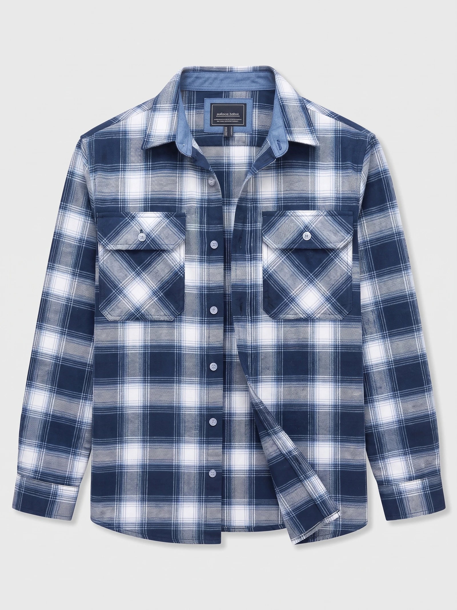 Blue plaid flannel shirt laid flat, featuring a button-down front, pointed collar, and two button-flap chest pockets.