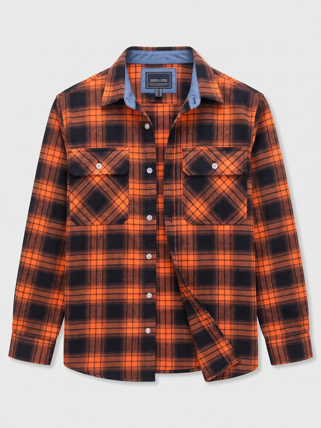 Orange plaid flannel shirt laid flat, featuring a button-down front, pointed collar, and two buttoned chest pockets.