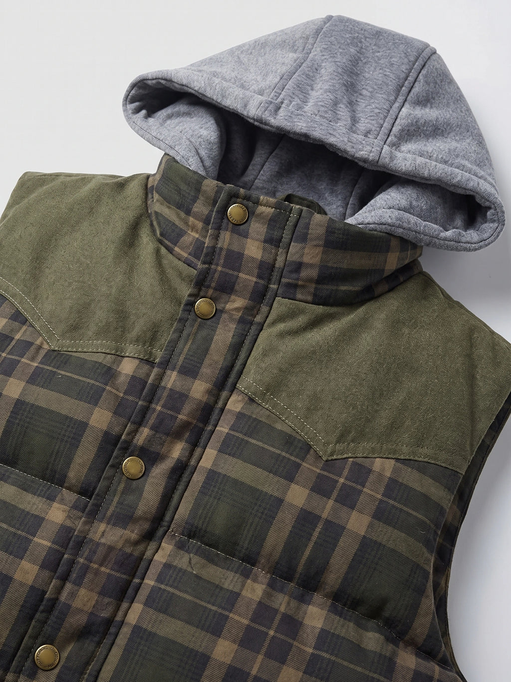 Green Puffer Vest detail showing the hood, plaid button-front placket, and stitched shoulder panels.