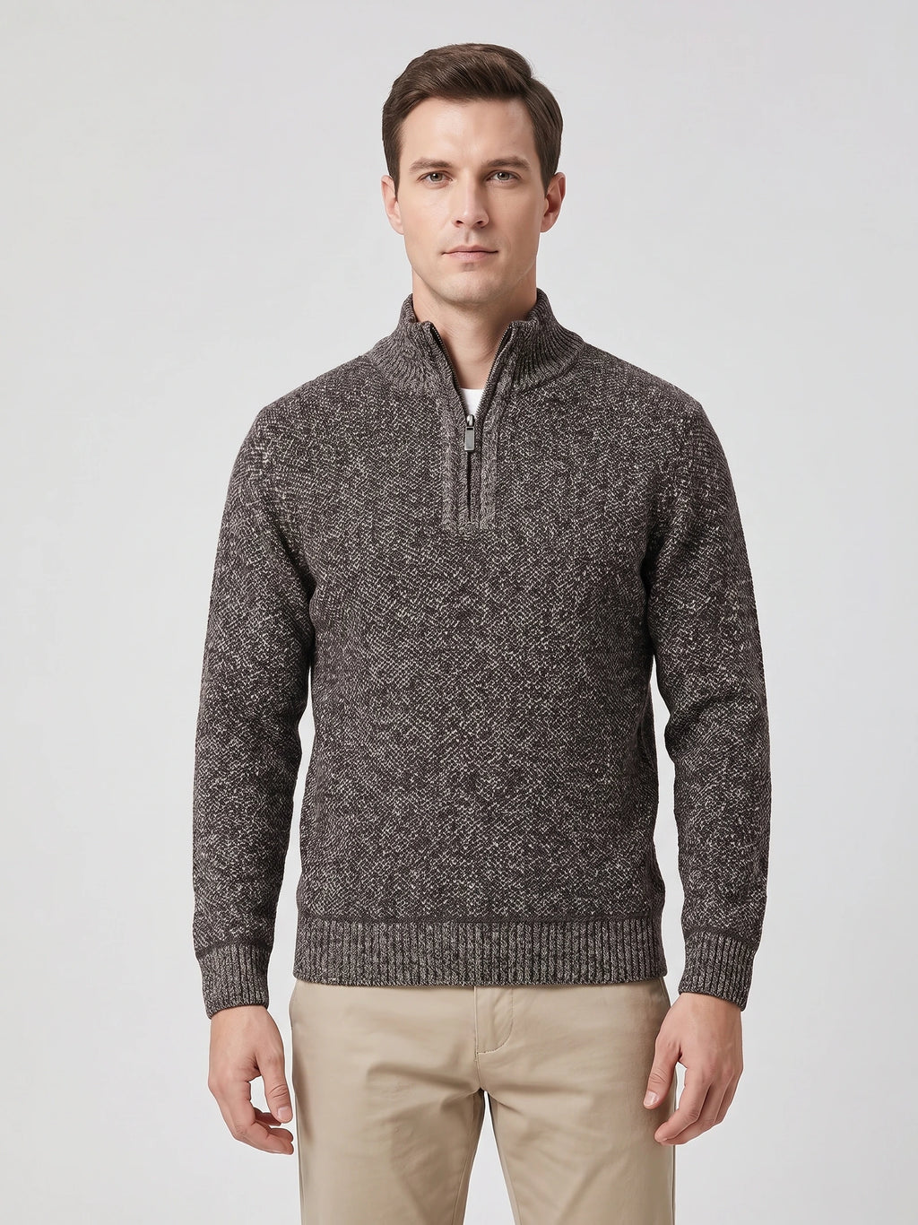 Front studio view of a model wearing a Brown Quarter Zip Sweater with a ribbed mock neck and cuffs.