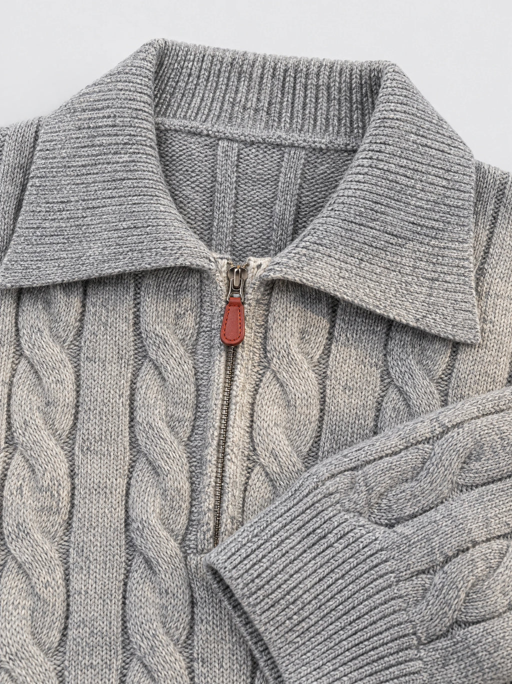 Gray cotton Quarter Zip Sweater detail showing the ribbed polo collar, cable-knit texture, and zip pull.