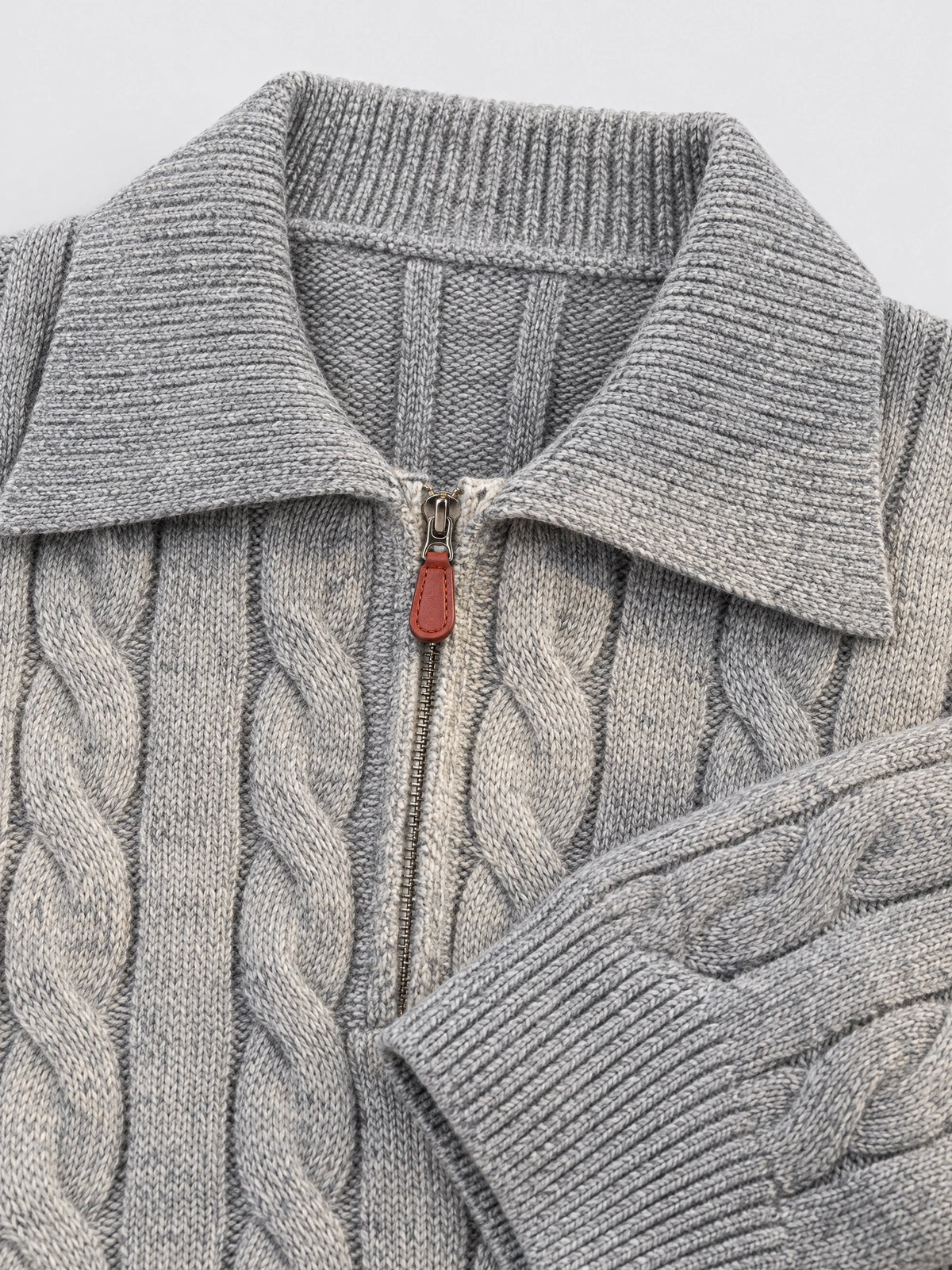 Gray cotton Quarter Zip Sweater detail showing the ribbed polo collar, cable-knit texture, and zip pull.