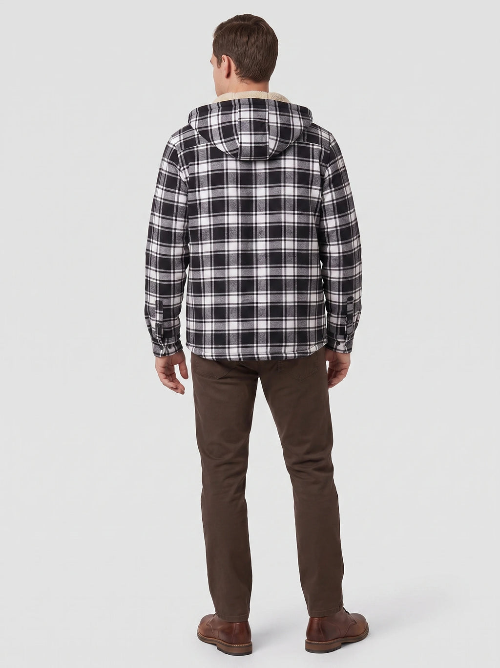 Rear studio view of a model wearing a Black plaid Sherpa Lined Jacket with a hood and button cuffs.