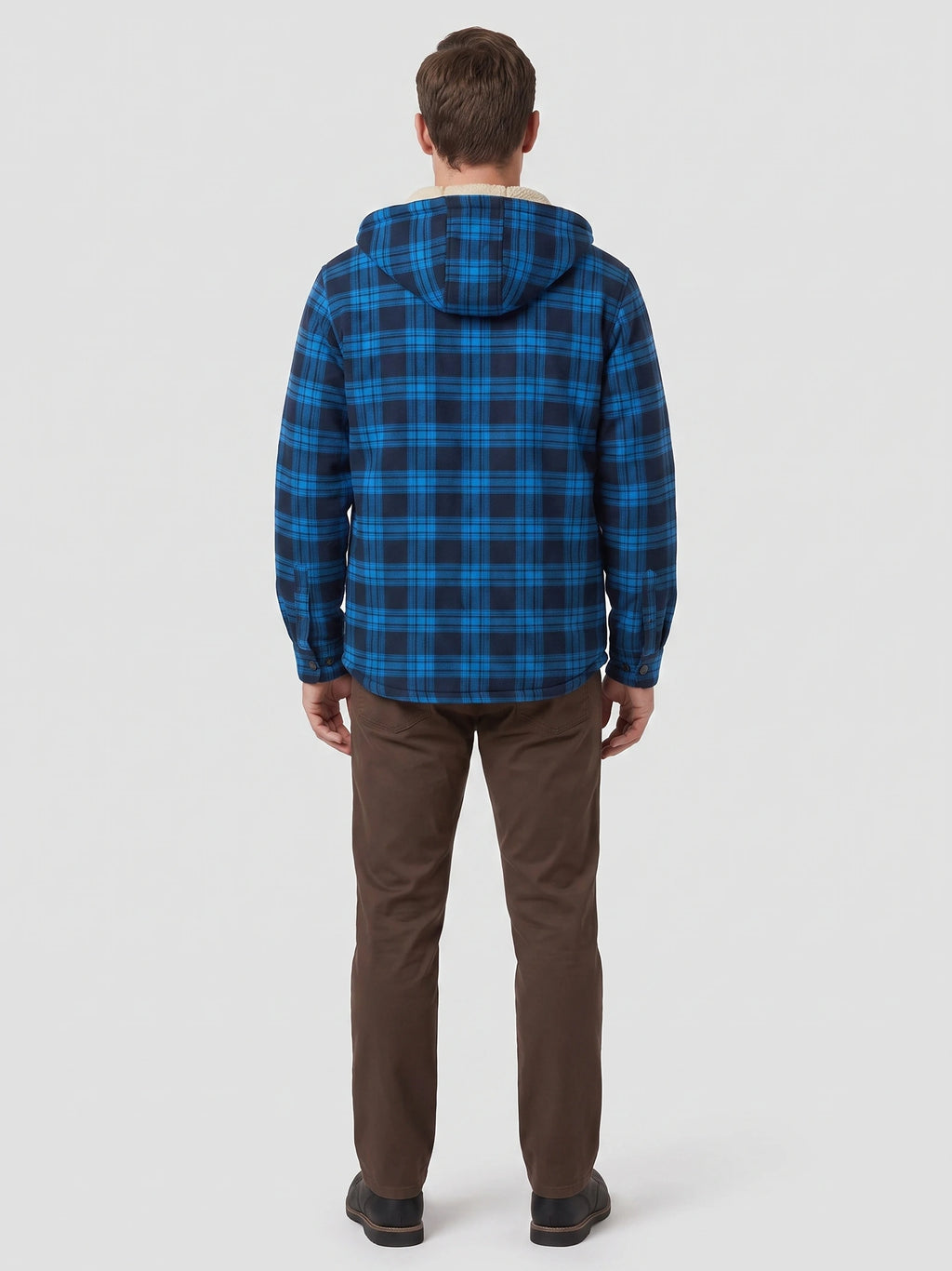 Rear studio view of a model wearing a Blue plaid Sherpa Lined Jacket with a hood.