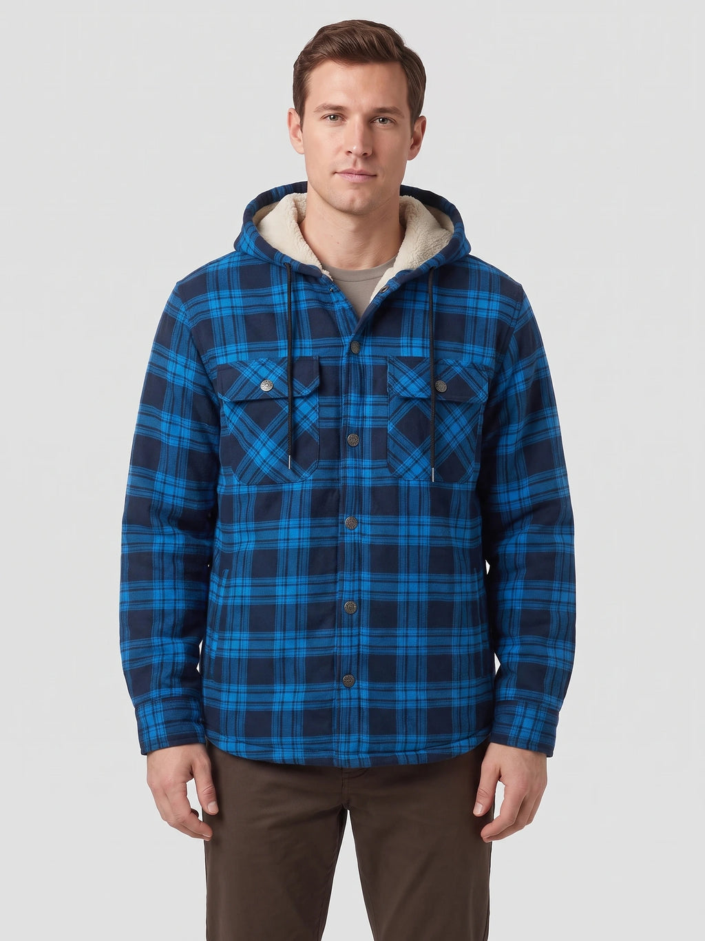 Front studio view of a model wearing a Blue plaid Sherpa Lined Jacket with a hood, button front, and flap chest pockets.