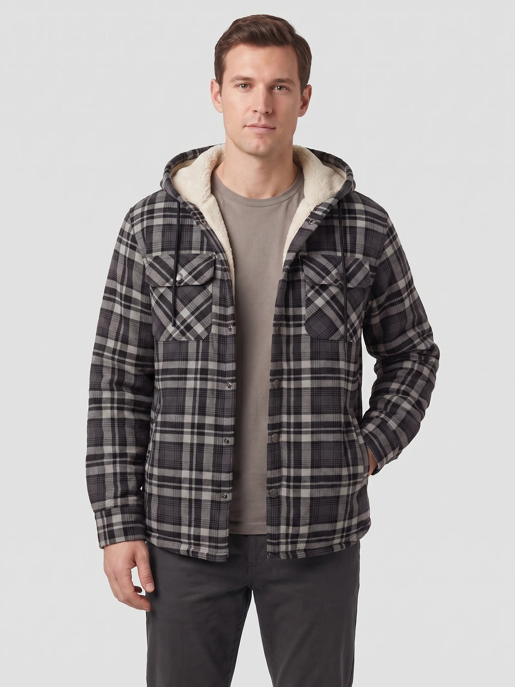 Front studio view of a model wearing a Gray plaid Sherpa Lined Jacket with a hood, button front, and flap chest pockets.