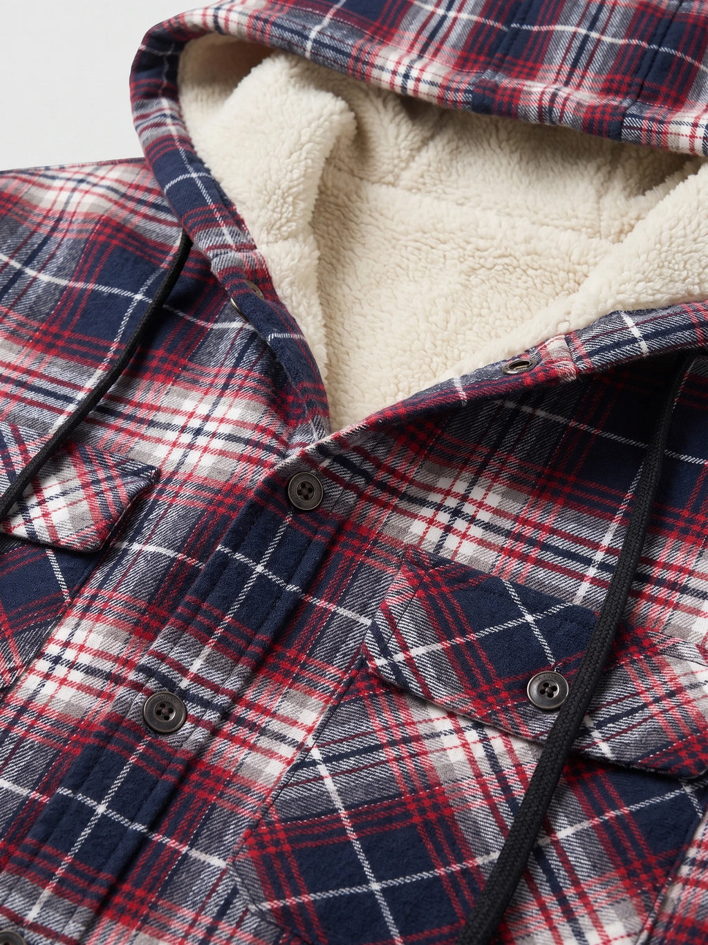 Close-up of the Red Sherpa Lined Jacket hood, showing the plush lining, plaid fabric, drawstrings, and buttoned chest pockets.