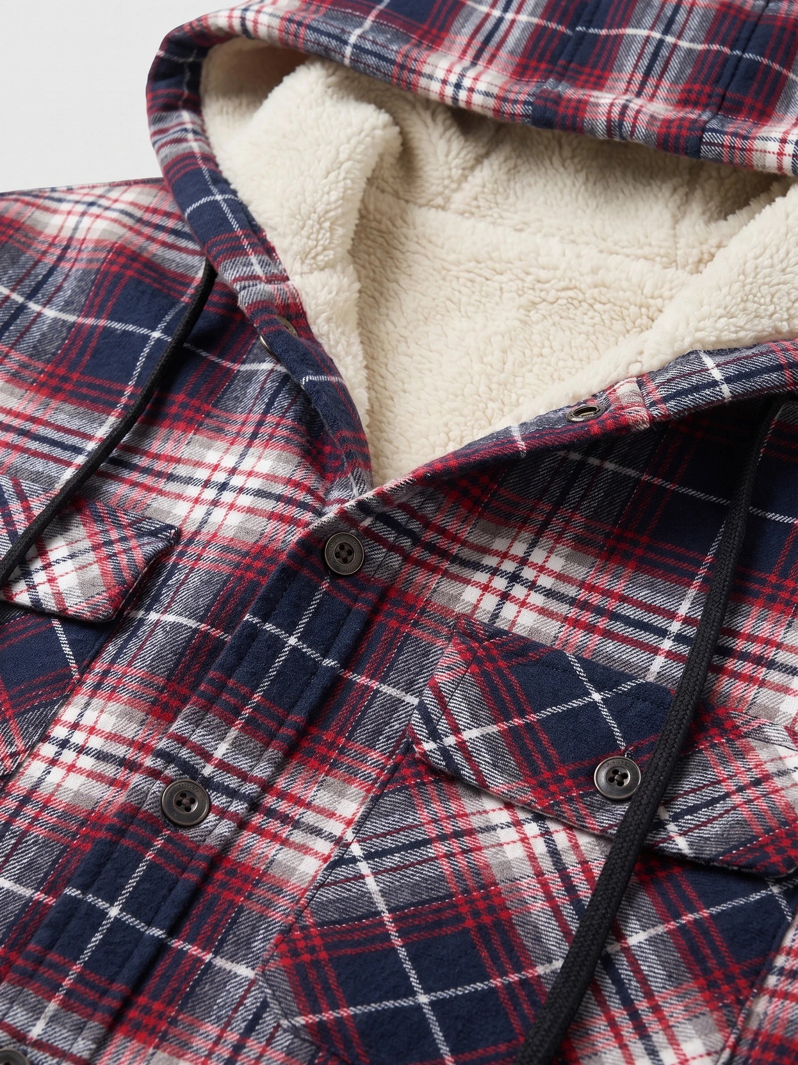 Close-up of the Red Sherpa Lined Jacket hood, showing the plush lining, plaid fabric, drawstrings, and buttoned chest pockets.