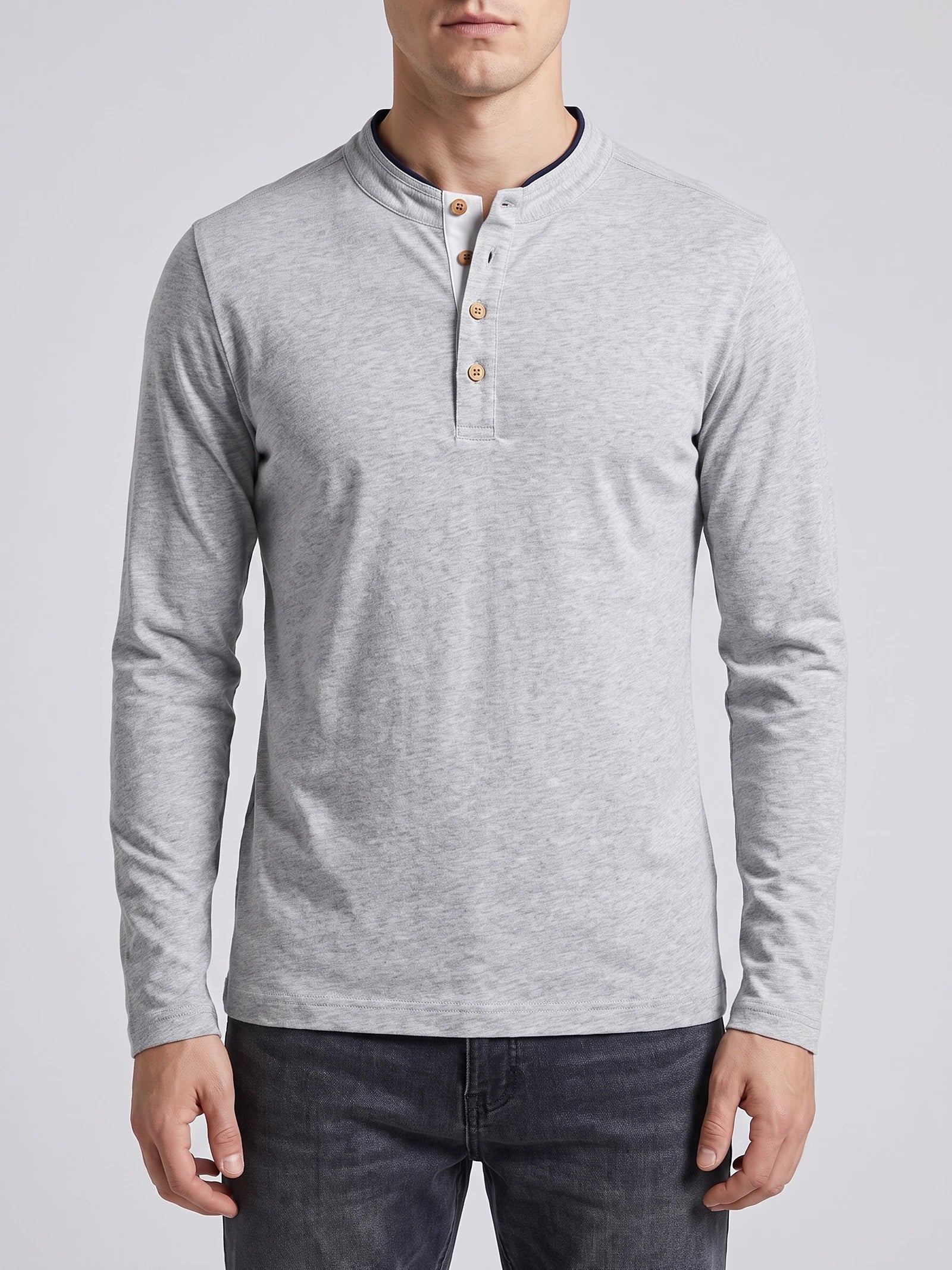 Front studio view of a model wearing a Gray Slim-Fit cotton long-sleeve Henley shirt with a button placket.