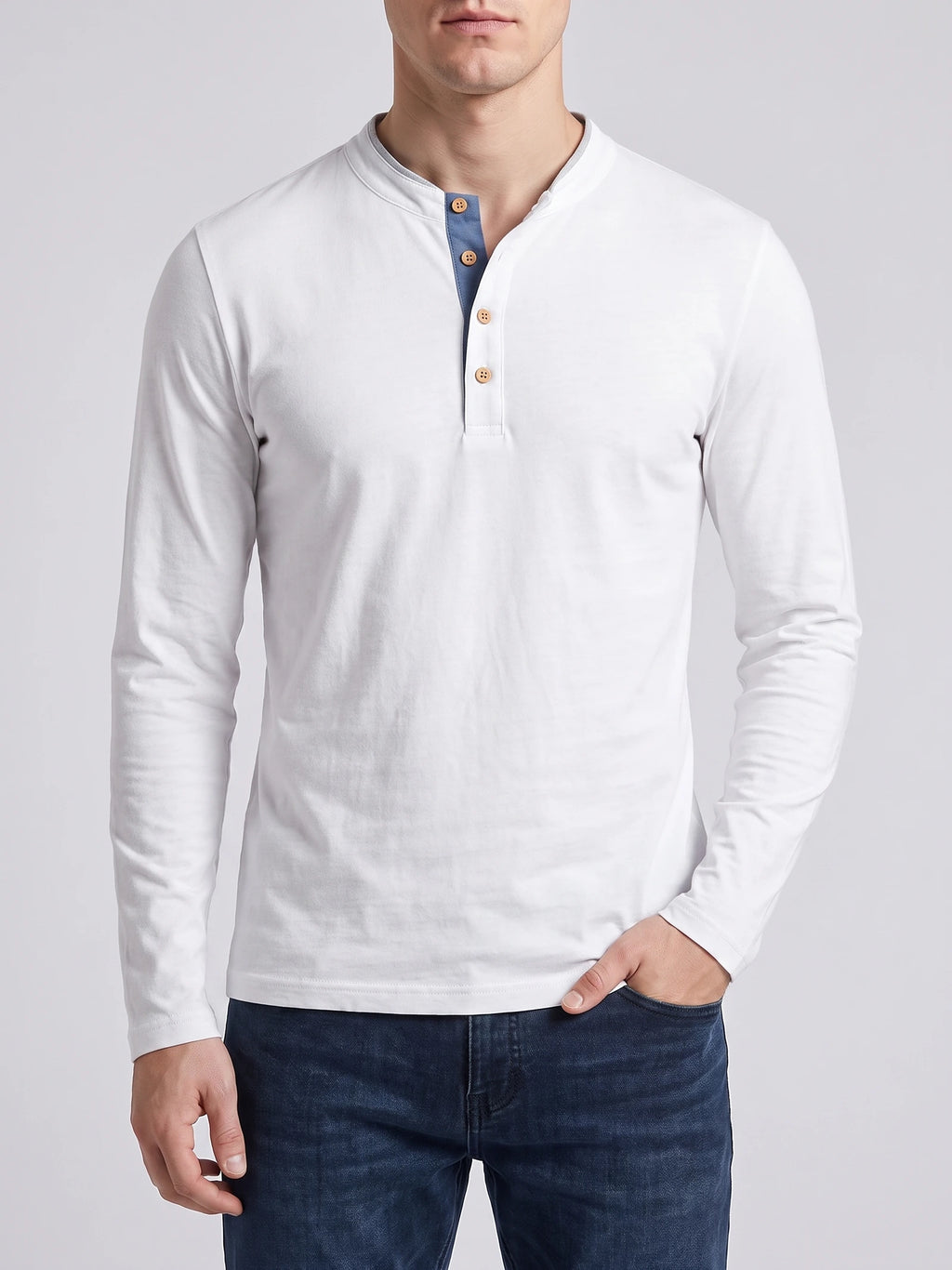 Front studio view of a model wearing a White Slim-Fit cotton long-sleeve Henley shirt with a button placket.