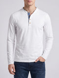 Front studio view of a model wearing a White Slim-Fit cotton long-sleeve Henley shirt with a button placket.