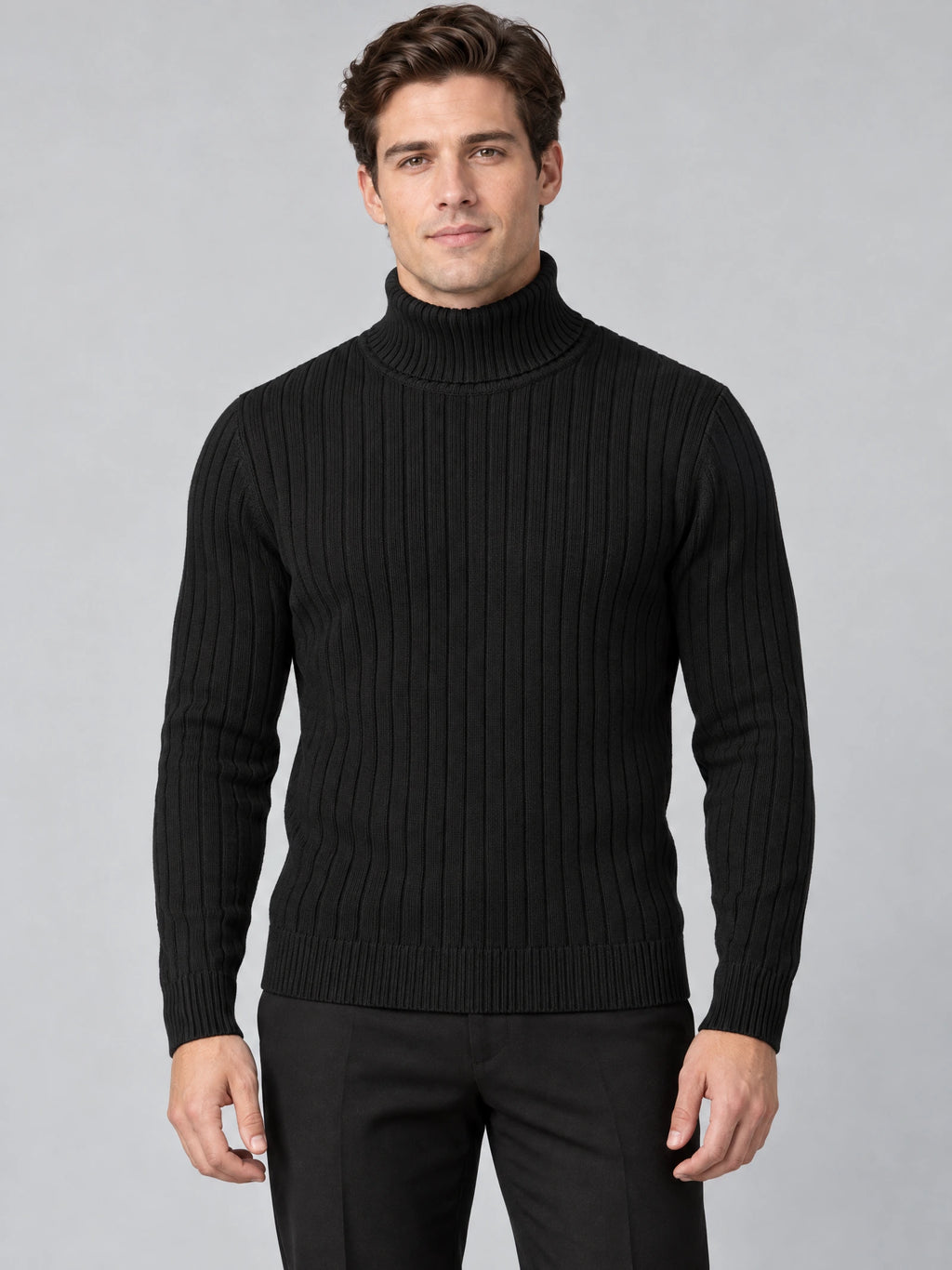 Front studio view of a model wearing a Black slim fit pullover sweater with a ribbed turtleneck and vertical knit texture.