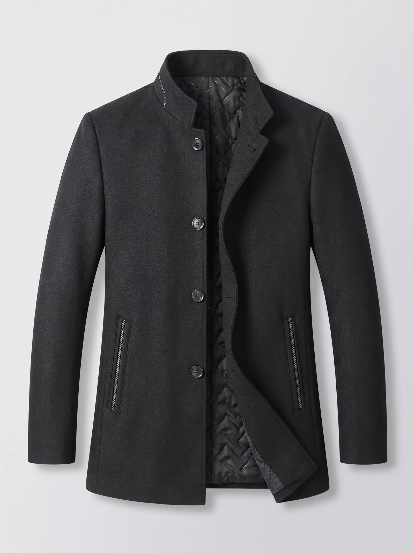 Black wool overcoat laid flat with a stand collar, button front, zippered pockets, and quilted lining.