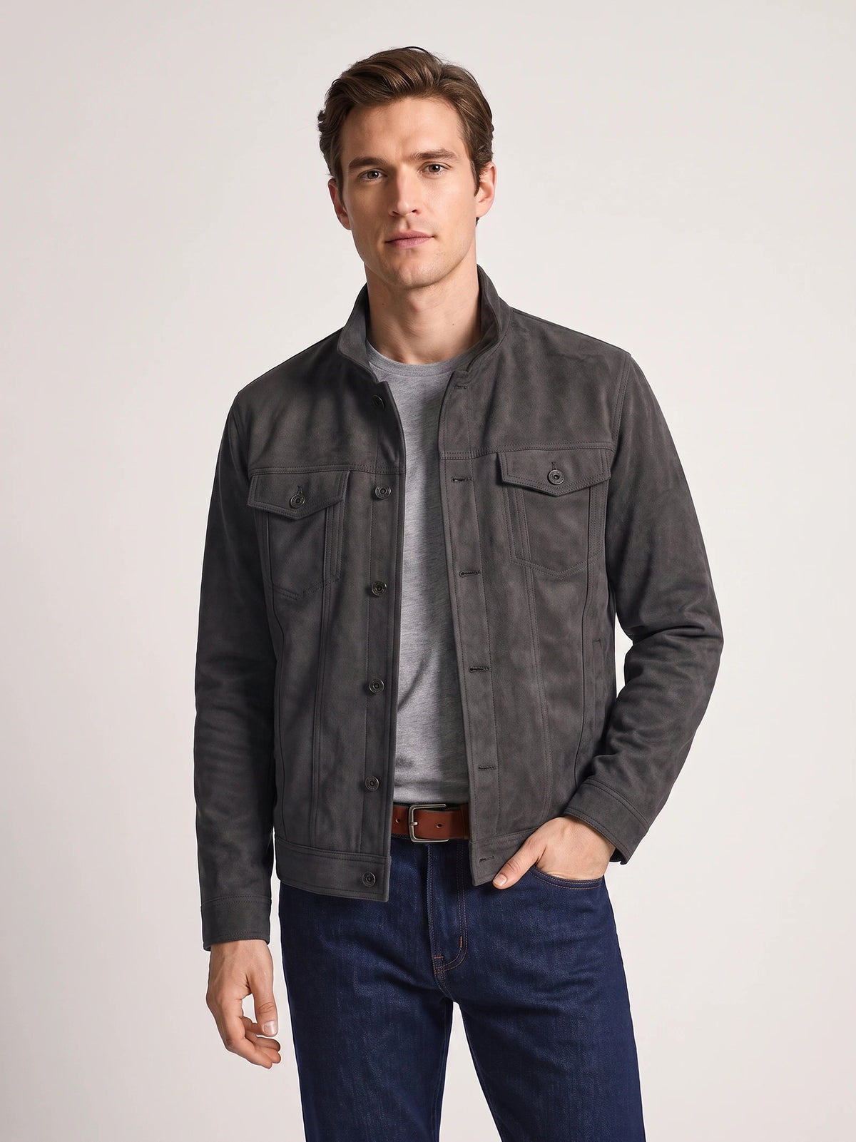 Front studio view of a model wearing a Gray Suede Fall Jacket with a stand collar, button front, and flap chest pockets.