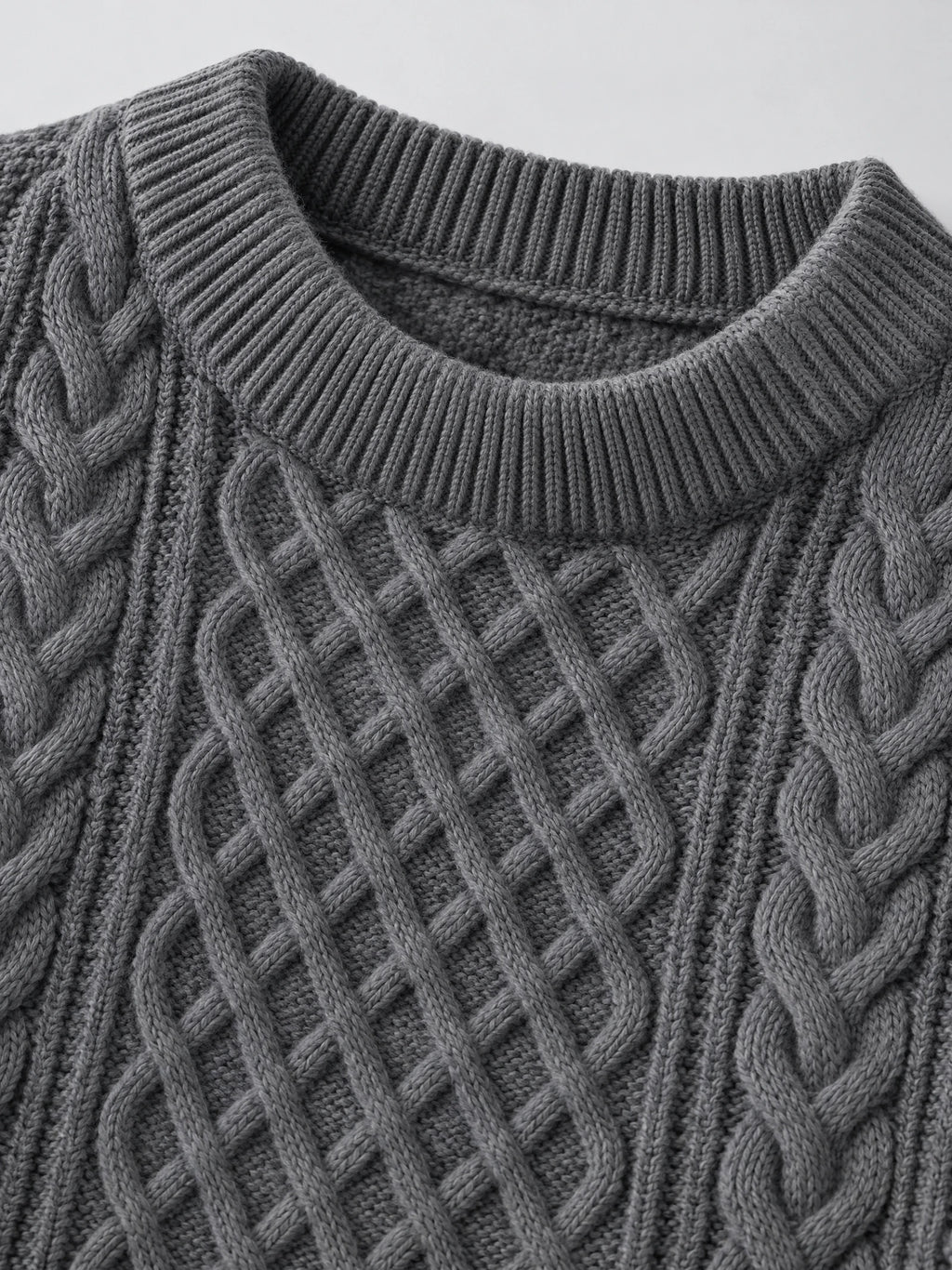Close-up of the Charcoal men's Thick Sweater showing its ribbed O-neck collar and cable-knit texture.