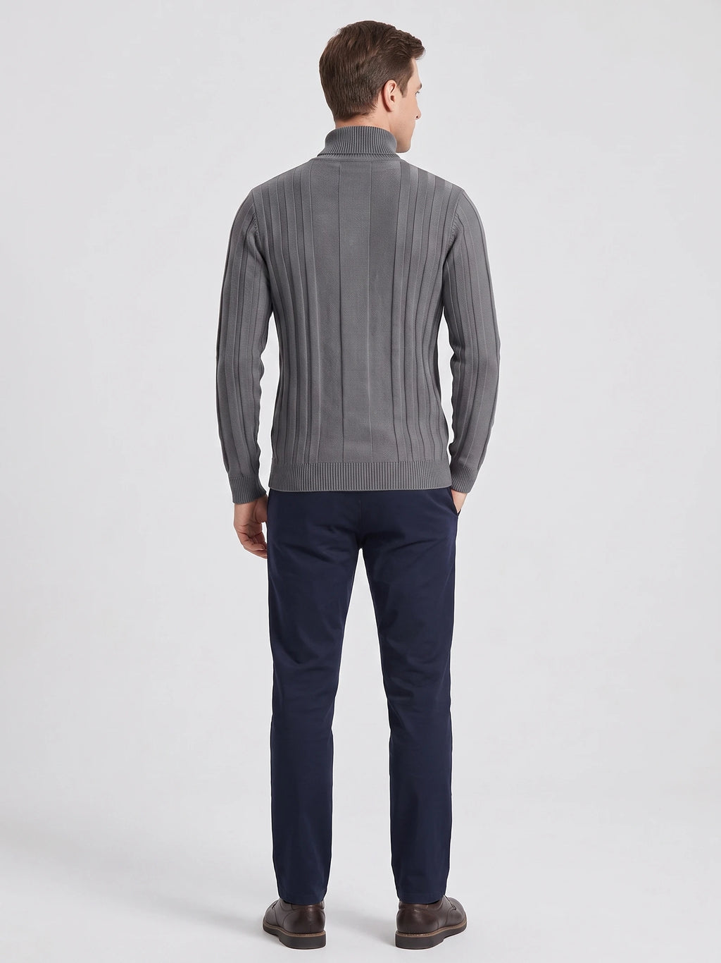 Rear studio view of a model wearing a Gray cotton Turtleneck Sweater with vertical ribbed stripes.