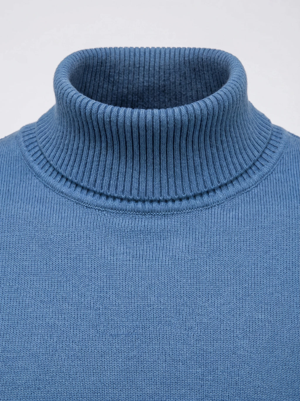 Close-up of the ribbed high neck and fine knit texture on a Blue men's Turtleneck Sweater.