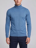 Front studio view of a model wearing a Blue slim-fit Turtleneck Sweater with ribbed high neck, cuffs, and hem.