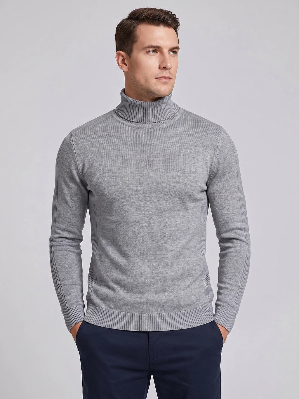 Model wearing a Gray men's turtleneck sweater with a ribbed high neck, cuffs, and hem in a front studio view.