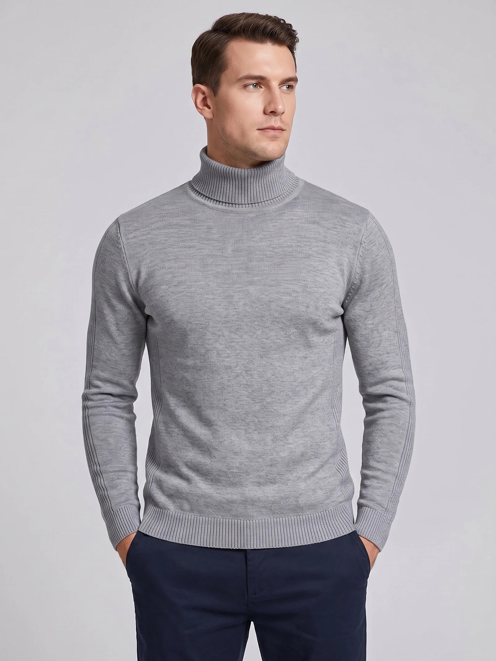Model wearing a Gray men's turtleneck sweater with a ribbed high neck, cuffs, and hem in a front studio view.