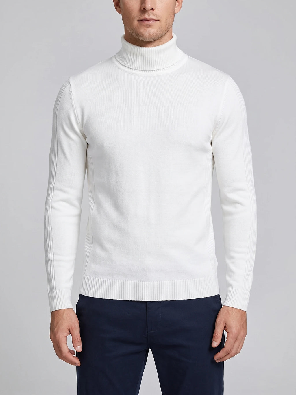 Front studio view of a model wearing a White slim-fit Turtleneck Sweater with ribbed high neck, cuffs, hem, and sleeve detailing.
