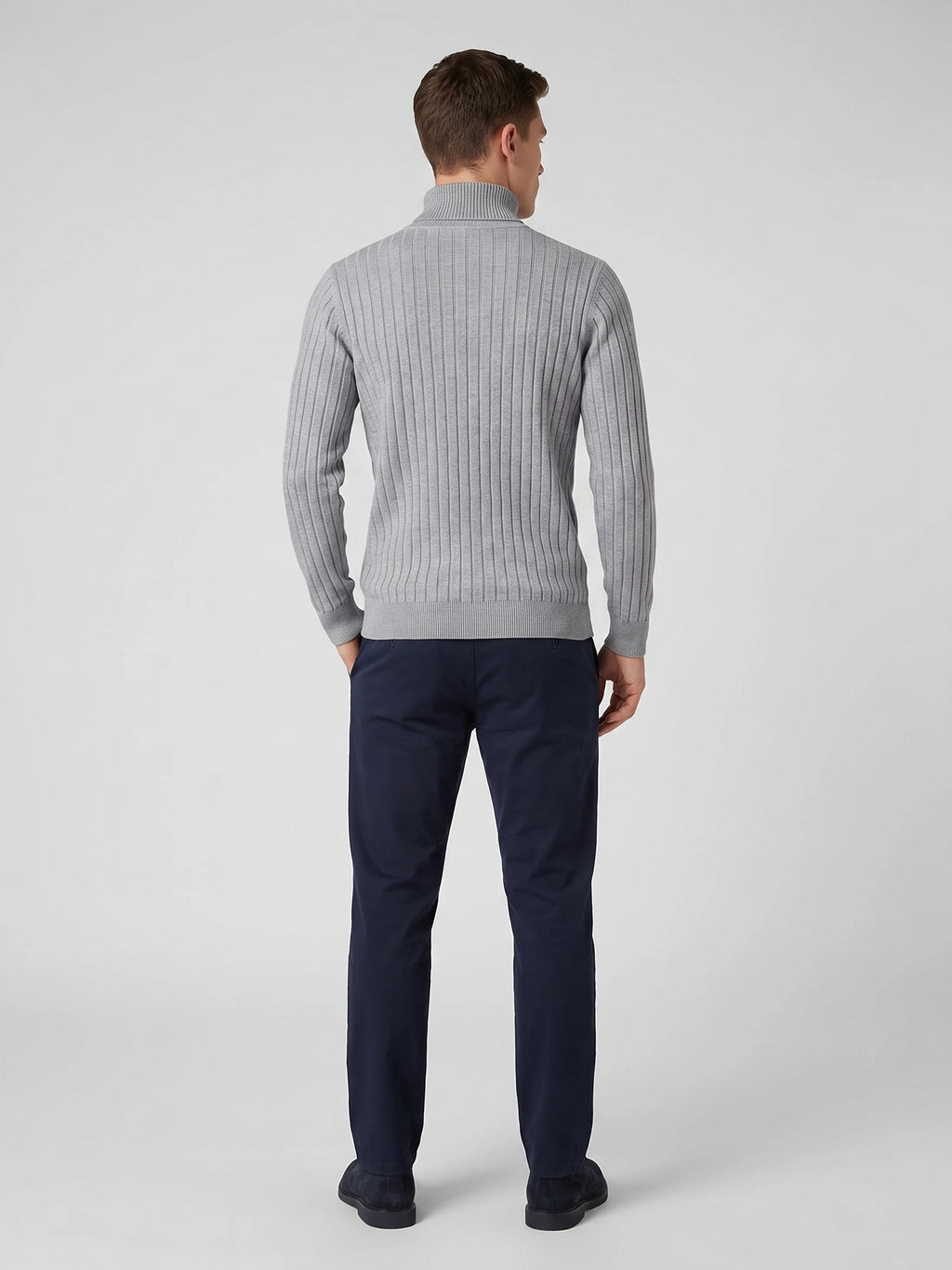 Rear studio view of a model wearing a Gray turtleneck sweater with vertical ribbed knit texture.