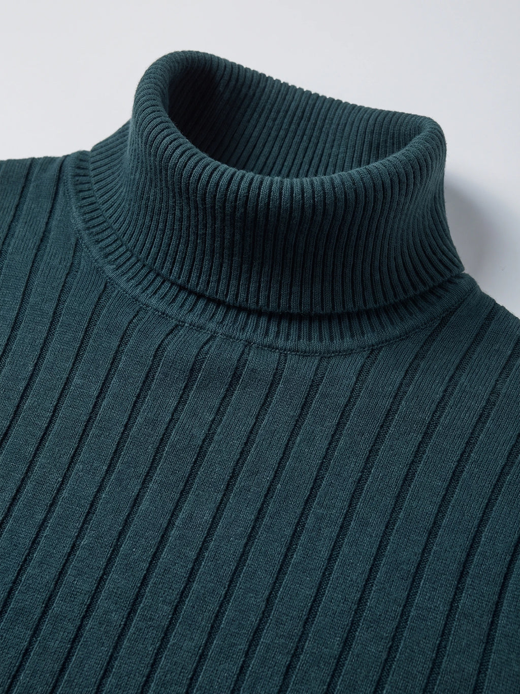 Close-up of the Green men's Turtleneck Sweater, showing its ribbed fold-over collar and vertically textured knit.