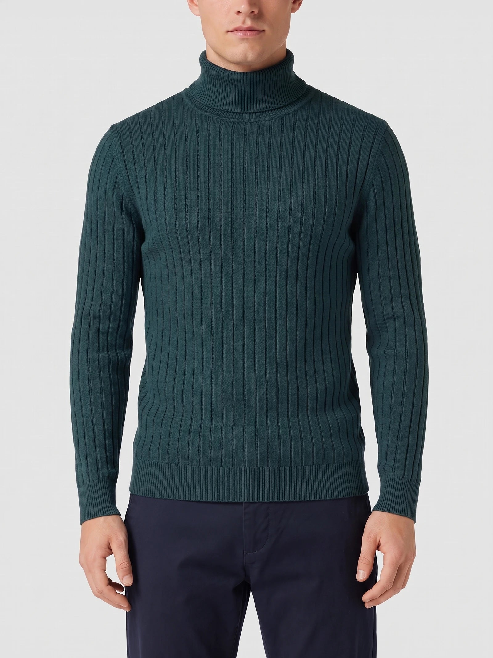 Front studio view of a model wearing a Green ribbed Turtleneck Sweater with a high collar and long sleeves.